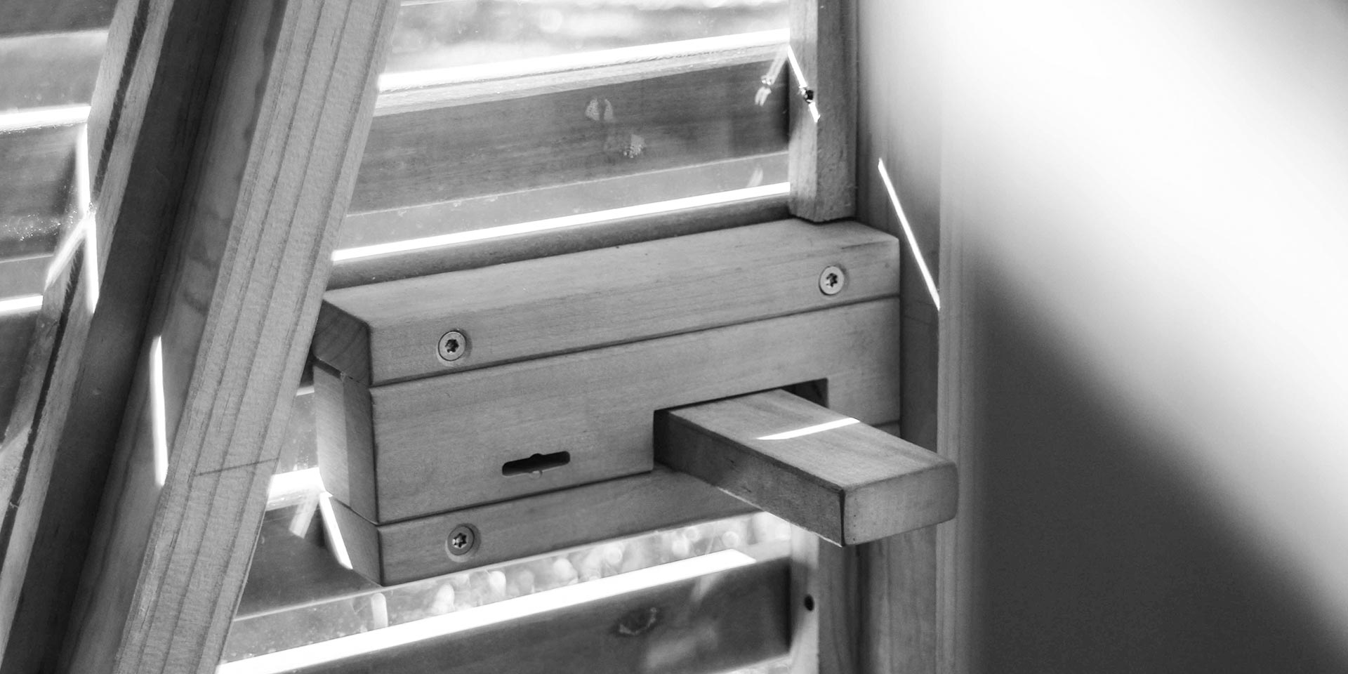 A hand made wooden lock and door handle