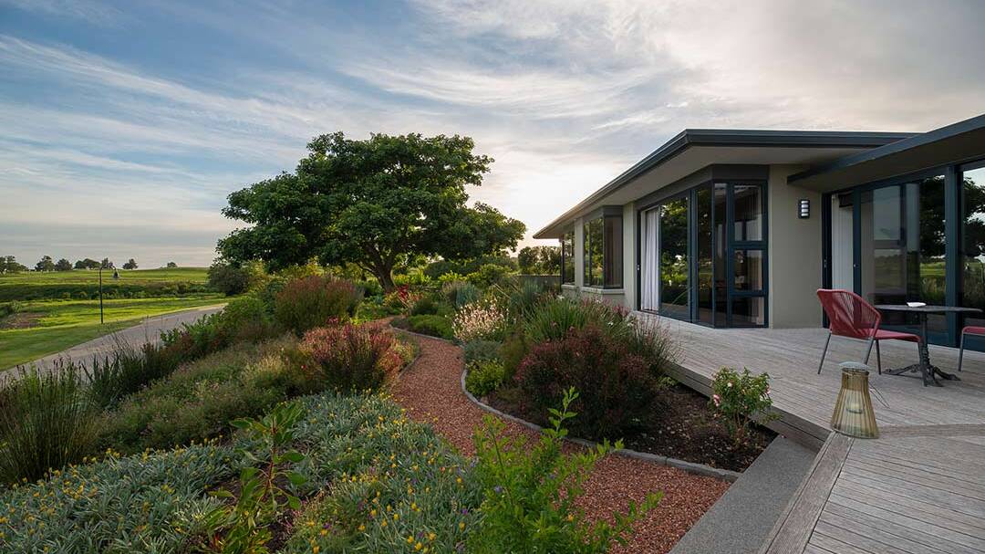 Outdoor living beneath mature Erythrina canopy, Fancourt