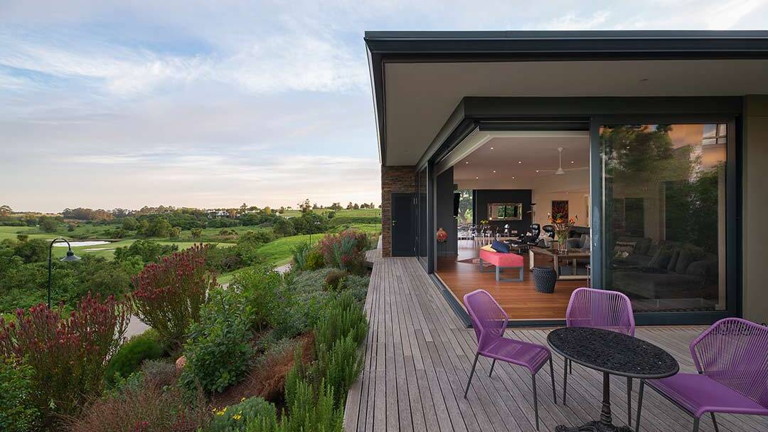 Deck hovering above indigenous planting at House 3553
