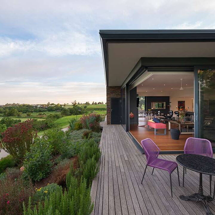 Deck hovering above indigenous planting at House 3553