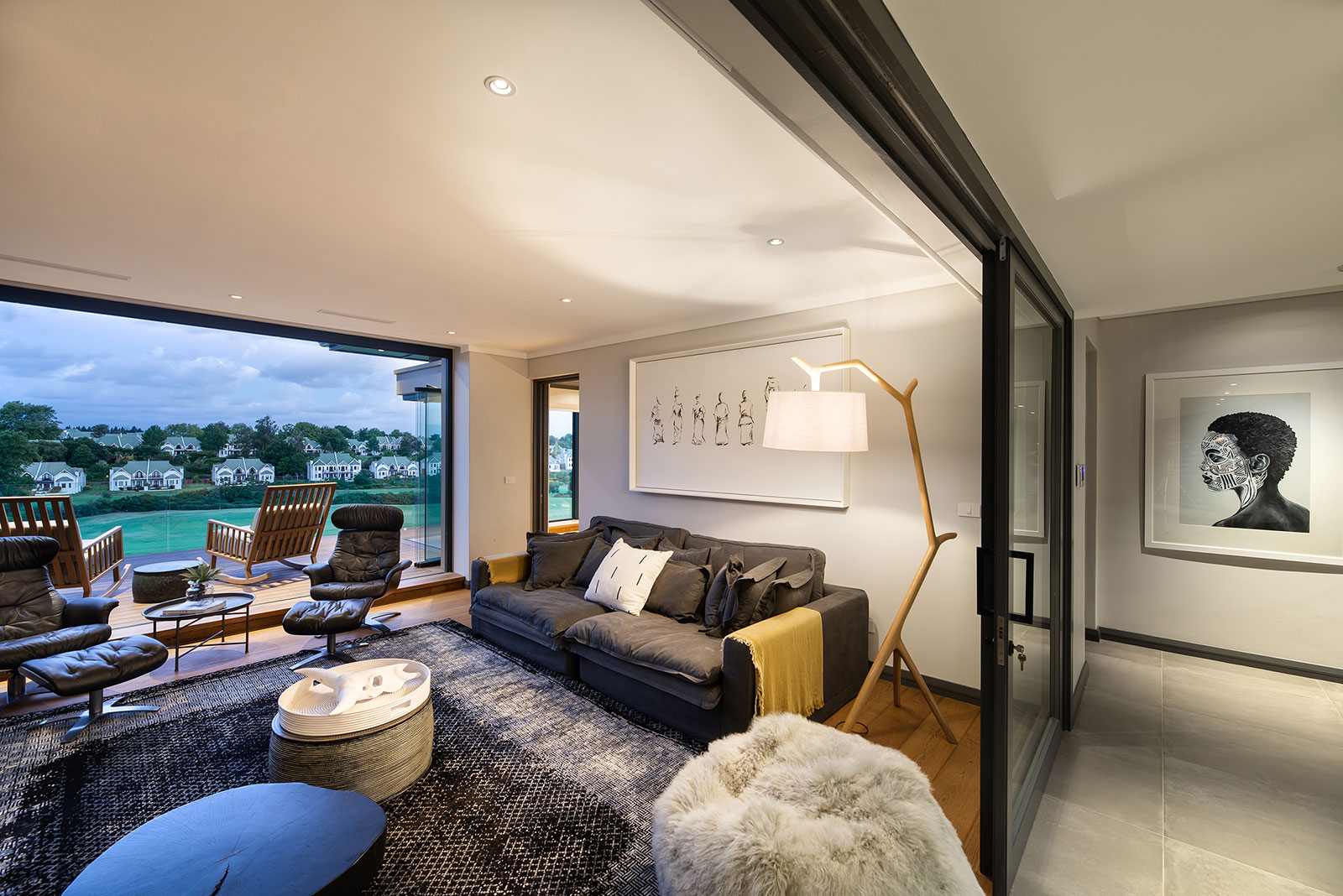 First floor lounge opening to balcony with views across Fancourt Golf Estate