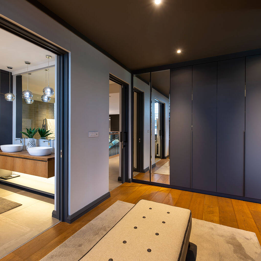 Master bedroom closet and entrance to bathroom