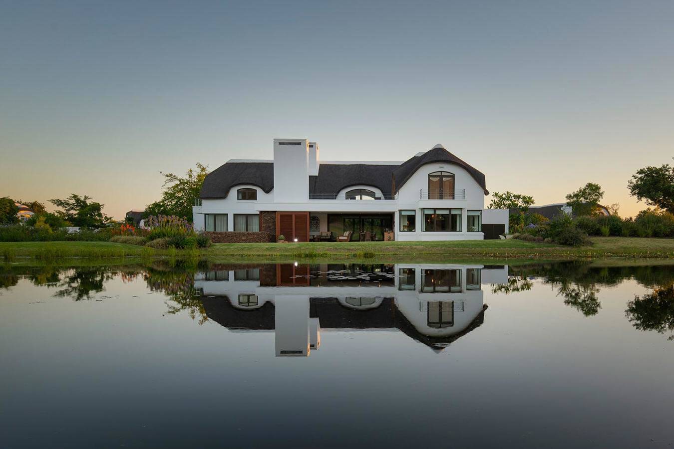 Front facade, a contemporary garden route golf estate home.