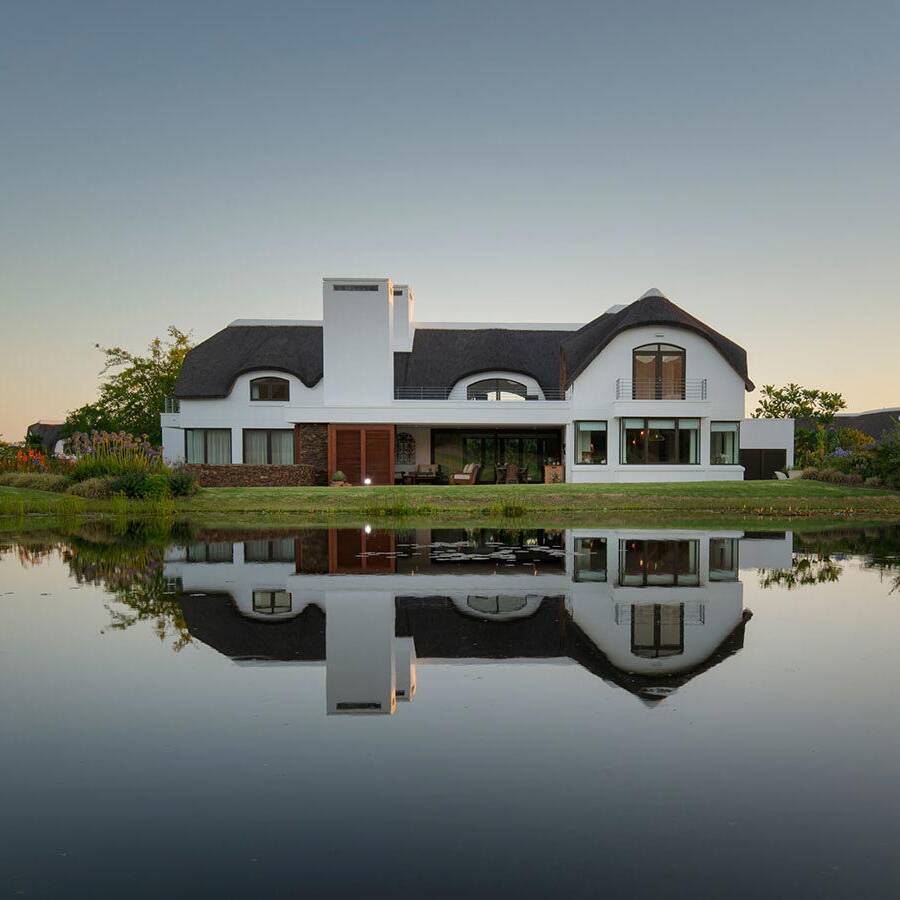Front facade, a contemporary garden route golf estate home.
