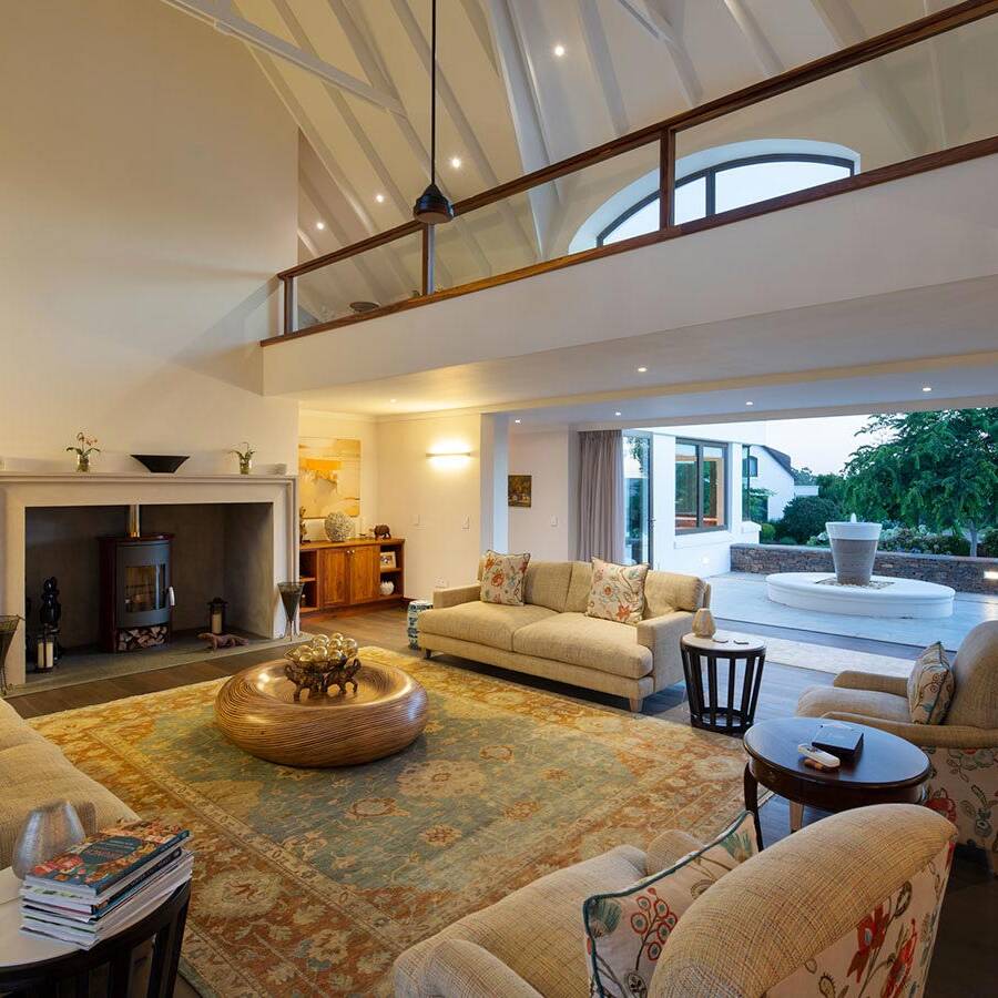 Double volume interior of contemporary garden route home designed by FC Holm