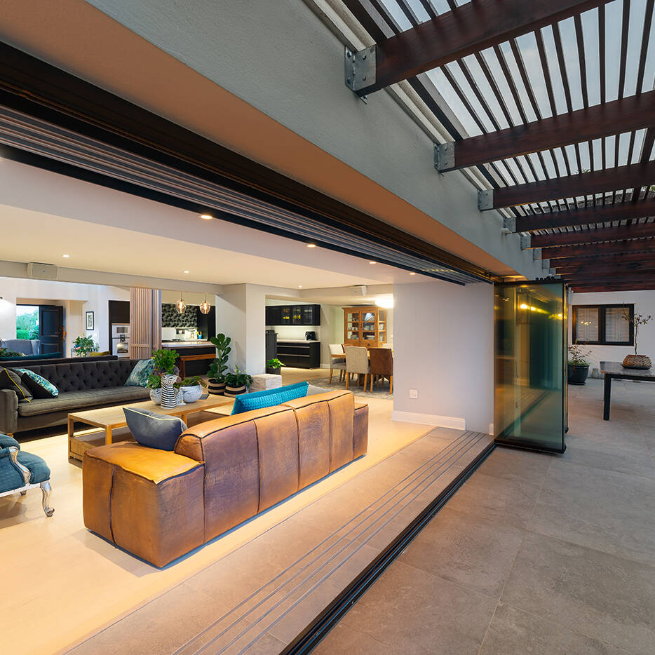 Living space and outdoor flow of renovated villa in George, South Africa