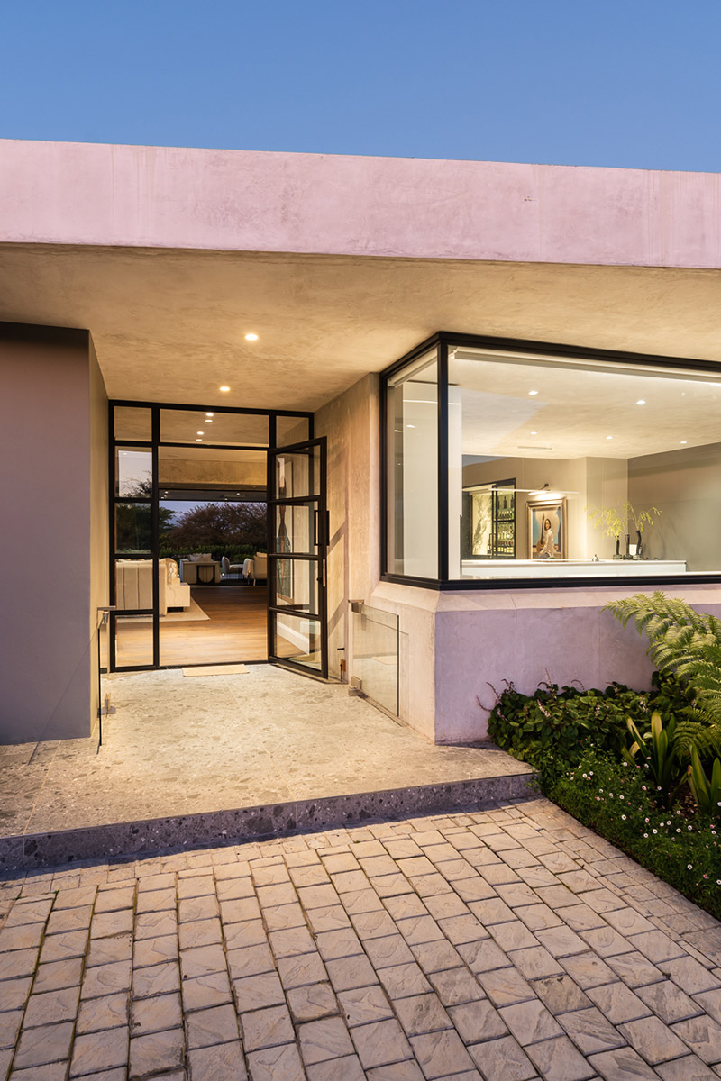 Twilight view of a Fancourt villa exterior