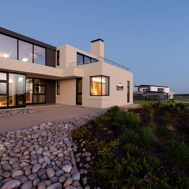 Oubaai golf villa facade at twilight