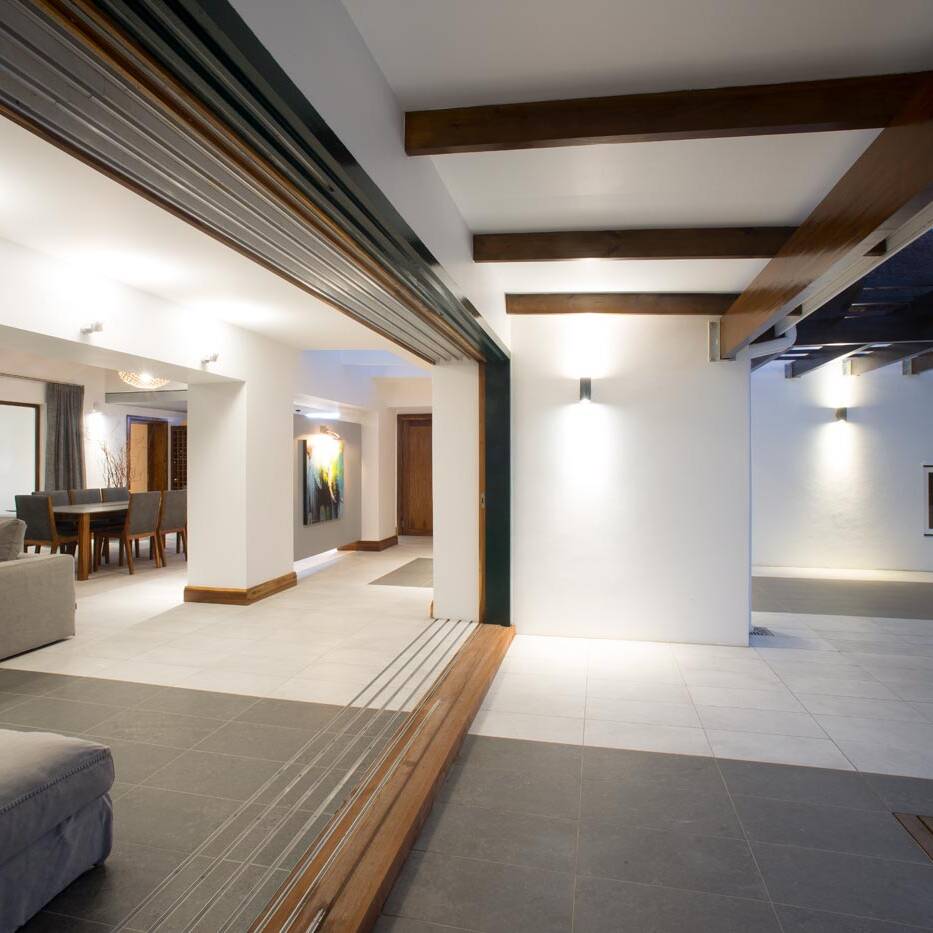 Interior exterior flow in modern estate home designed by architect FC Holm