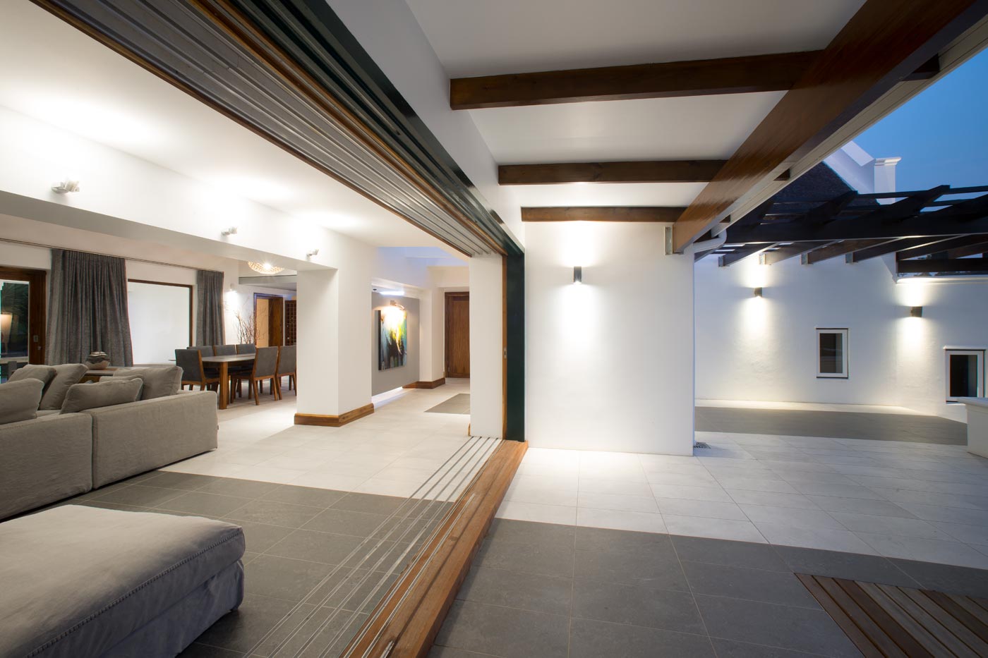 Interior exterior flow in modern estate home designed by architect FC Holm