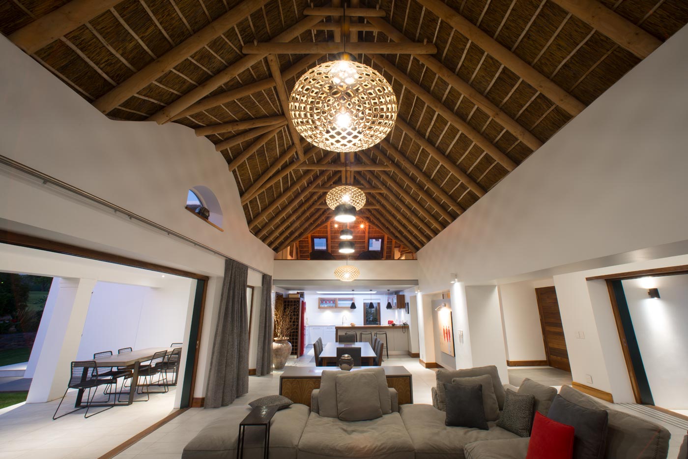 Feature exposed trusses and roof detail in southern cape golf estate home