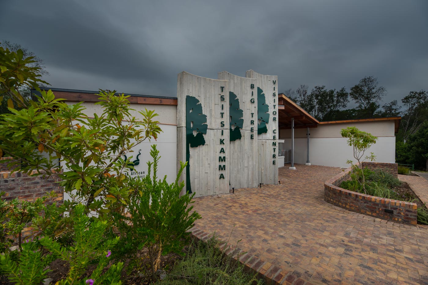 Tsitsikamma Big Tree visitor centre signage and landscaped brick pathway, Commercial Architecture Eastern Cape